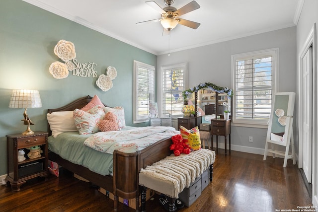 bedroom with ornamental molding, ceiling fan, baseboards, and wood finished floors