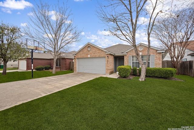 ranch-style home featuring brick siding, an attached garage, fence, and a front yard