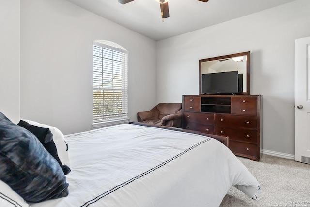 bedroom featuring carpet floors, ceiling fan, and baseboards