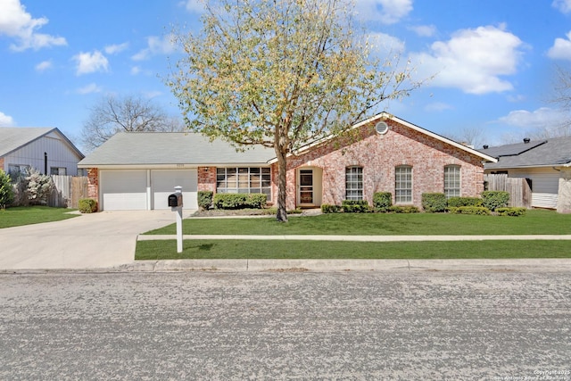 ranch-style house featuring an attached garage, driveway, a front lawn, and brick siding