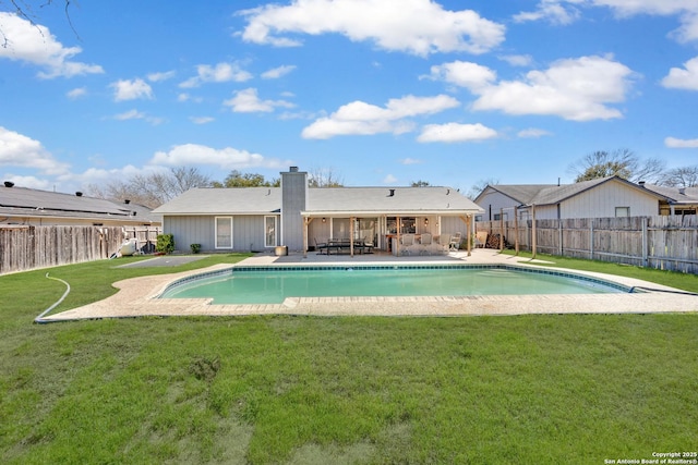 view of pool featuring a lawn, a fenced backyard, and a fenced in pool