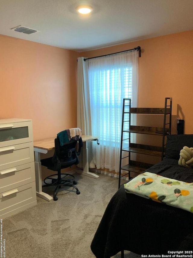 bedroom featuring carpet and visible vents