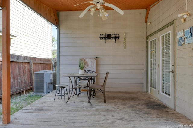 deck with a ceiling fan, central AC, and fence