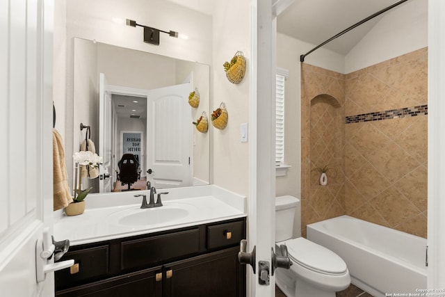 bathroom with toilet, shower / bathing tub combination, and vanity