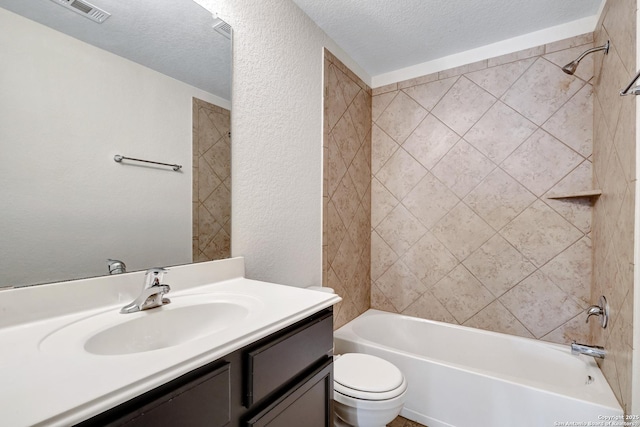 bathroom featuring visible vents, a textured wall, toilet, bathing tub / shower combination, and a textured ceiling