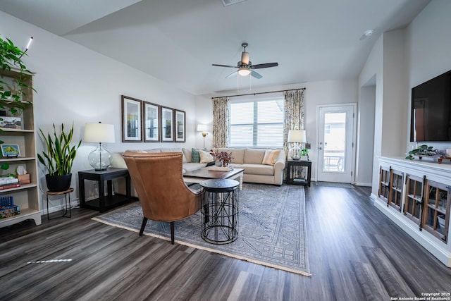 living area with lofted ceiling, a ceiling fan, baseboards, and wood finished floors