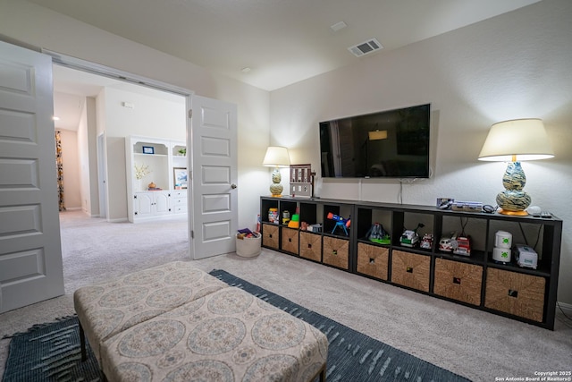 bedroom featuring carpet and visible vents