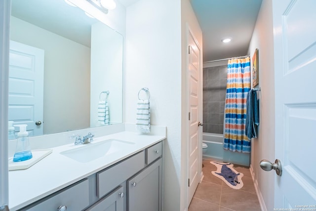 full bath with shower / tub combo with curtain, recessed lighting, toilet, vanity, and tile patterned flooring