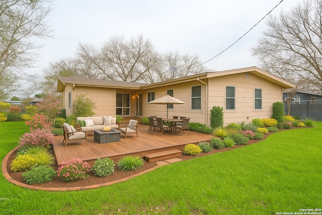 6138 Cedar Vly, San Antonio, TX 78242 - back of house with a lawn, outdoor dining space, a deck, and outdoor lounge area