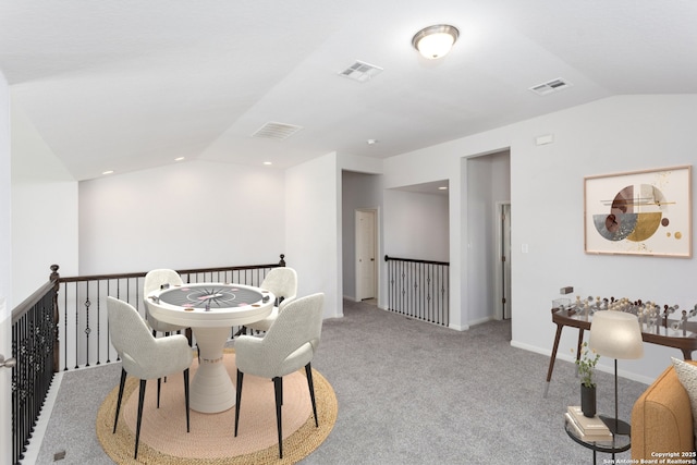 12816 Perdido, San Antonio, TX 78253 - carpeted dining space featuring lofted ceiling, visible vents, and baseboards