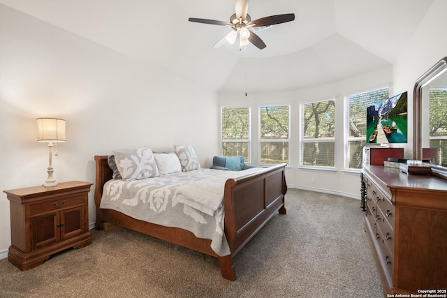 bedroom featuring lofted ceiling, a ceiling fan, baseboards, and carpet flooring