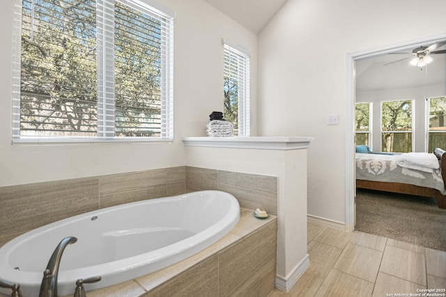 bathroom with connected bathroom and a wealth of natural light