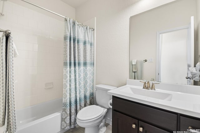 bathroom with toilet, shower / bath combo with shower curtain, and vanity