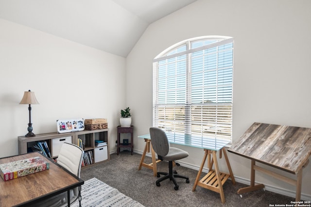 home office with carpet floors, plenty of natural light, baseboards, and lofted ceiling