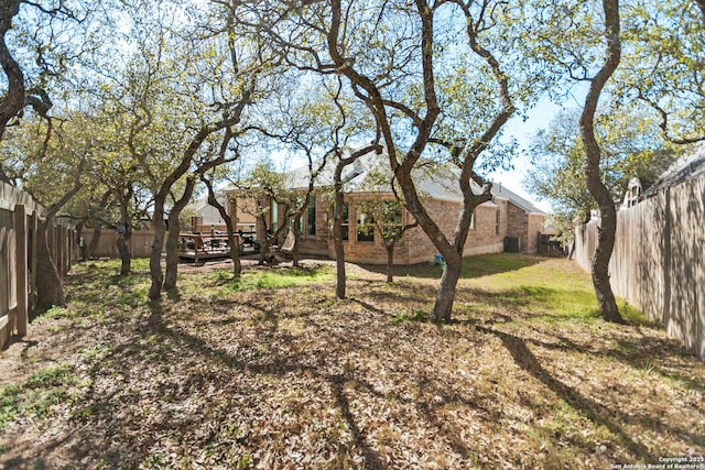 view of yard with a fenced backyard