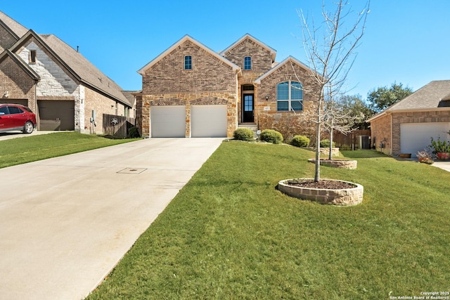 view of front facade featuring brick siding, concrete driveway, an attached garage, fence, and a front lawn