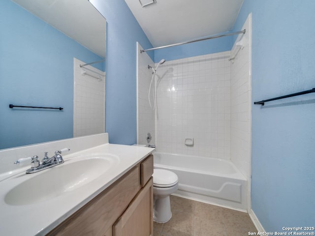 bathroom with toilet, tile patterned floors, tub / shower combination, and vanity