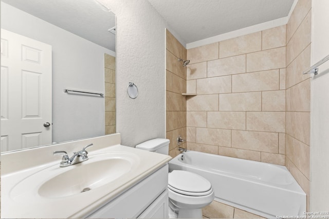 bathroom featuring a textured wall, toilet, a textured ceiling, vanity, and washtub / shower combination