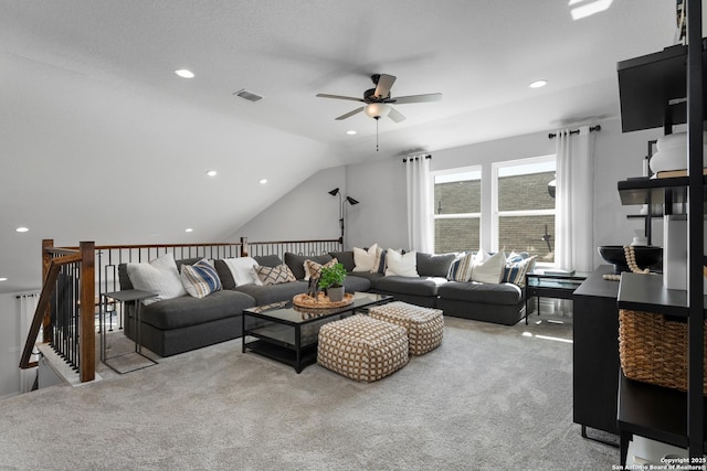 living room with visible vents, lofted ceiling, ceiling fan, carpet, and recessed lighting