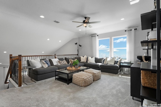 carpeted living area featuring lofted ceiling, visible vents, ceiling fan, and recessed lighting