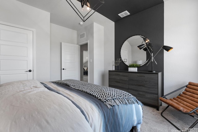 bedroom featuring carpet floors and visible vents