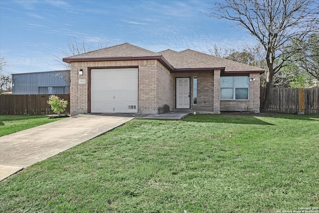 ranch-style home featuring a garage, brick siding, fence, driveway, and a front yard