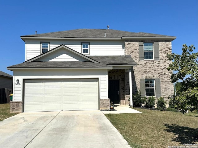 traditional-style home with a garage, a front lawn, concrete driveway, and brick siding