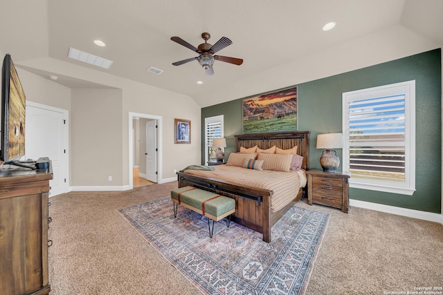 bedroom featuring lofted ceiling, visible vents, carpet floors, and baseboards