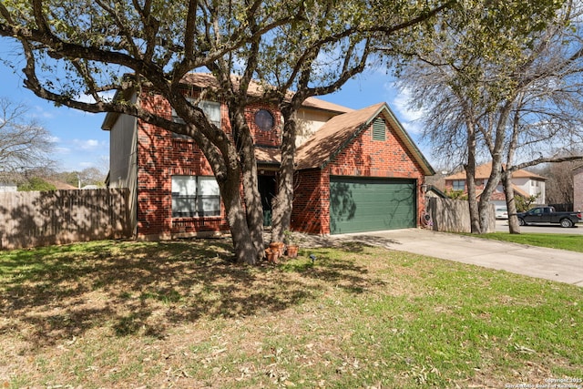 traditional home featuring concrete driveway, brick siding, and fence