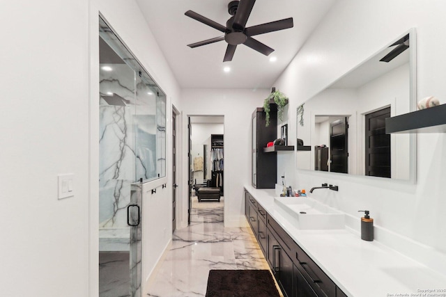 bathroom with a marble finish shower, ceiling fan, marble finish floor, vanity, and recessed lighting