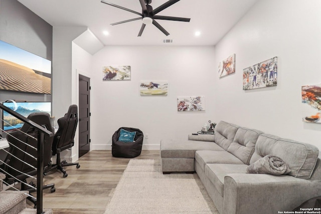 living area featuring ceiling fan, light wood-style flooring, recessed lighting, visible vents, and baseboards