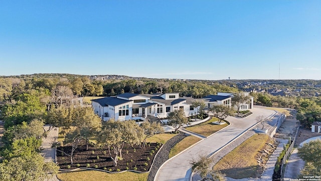 birds eye view of property with a residential view