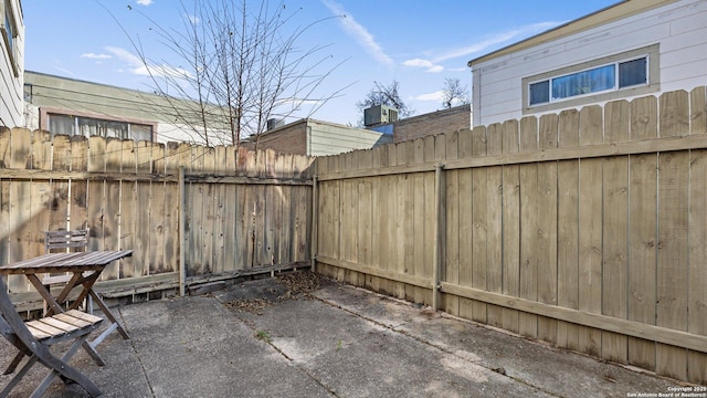 view of patio / terrace featuring fence