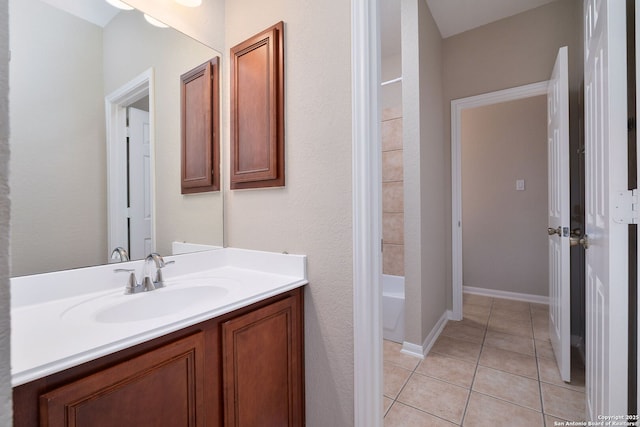 full bathroom featuring tile patterned flooring and vanity