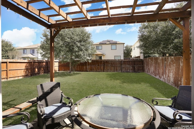 view of yard featuring a fenced backyard and a pergola