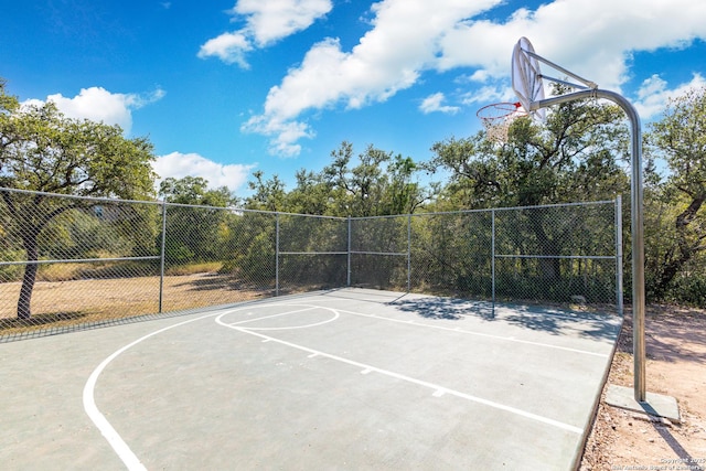 view of sport court with community basketball court and fence