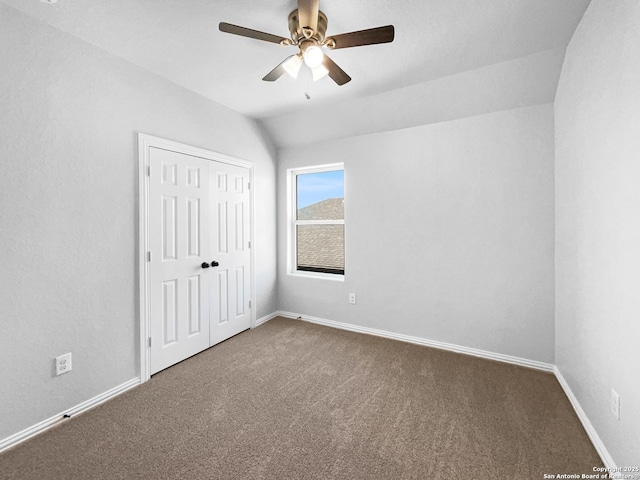12518 Ponder, San Antonio, TX 78245 - unfurnished bedroom featuring lofted ceiling, a closet, baseboards, and carpet floors