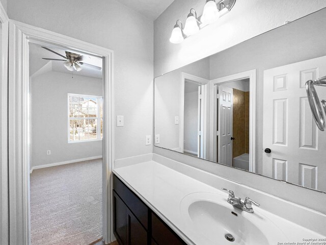 12518 Ponder, San Antonio, TX 78245 - bathroom with baseboards, a ceiling fan, and vanity