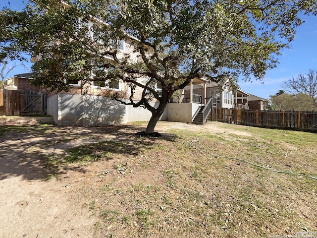 12518 Ponder, San Antonio, TX 78245 - view of yard featuring stairs and fence