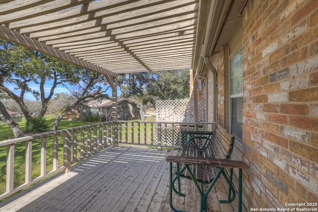 wooden deck with a pergola