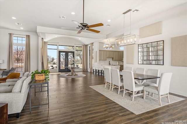 dining area featuring dark wood-style floors, french doors, and visible vents