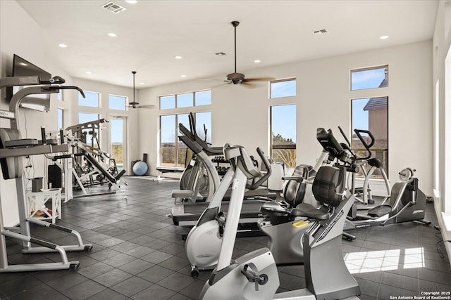 exercise room with visible vents, a ceiling fan, and recessed lighting