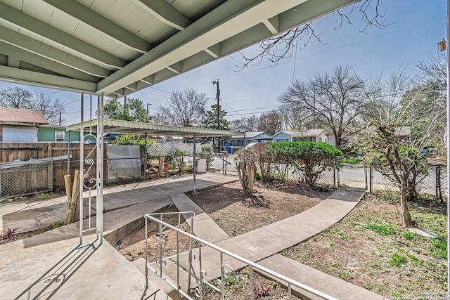 view of yard featuring a gate and fence