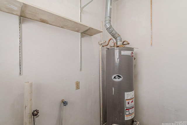 utility room with gas water heater