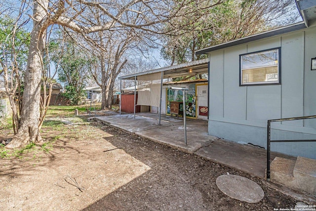 view of yard with a patio and fence