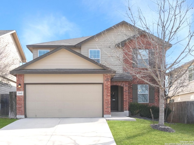 traditional home featuring a garage, brick siding, a front lawn, and fence