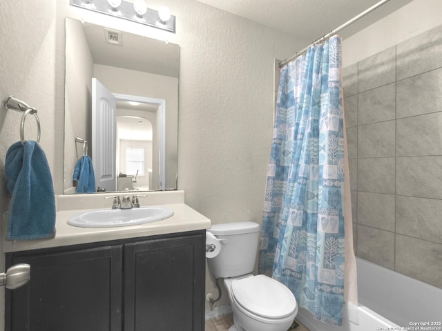 bathroom with visible vents, a textured wall, toilet, shower / bathtub combination with curtain, and vanity