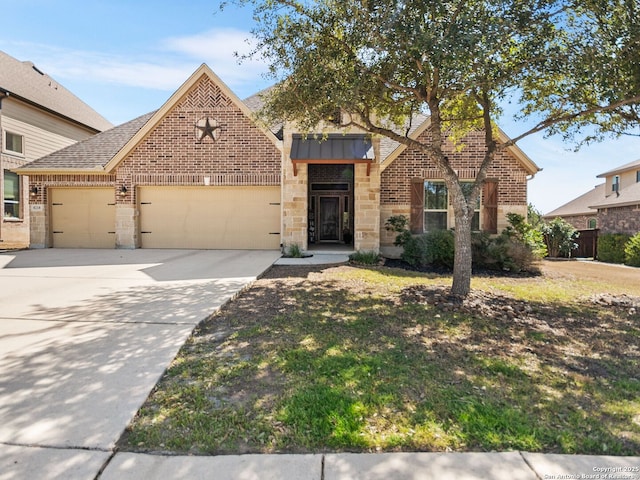 view of front facade with an attached garage, driveway, roof with shingles, and brick siding