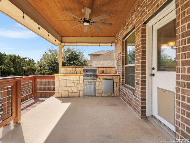 view of patio / terrace with ceiling fan, area for grilling, and an outdoor kitchen