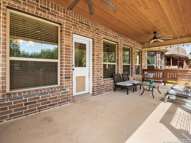 view of patio / terrace featuring ceiling fan